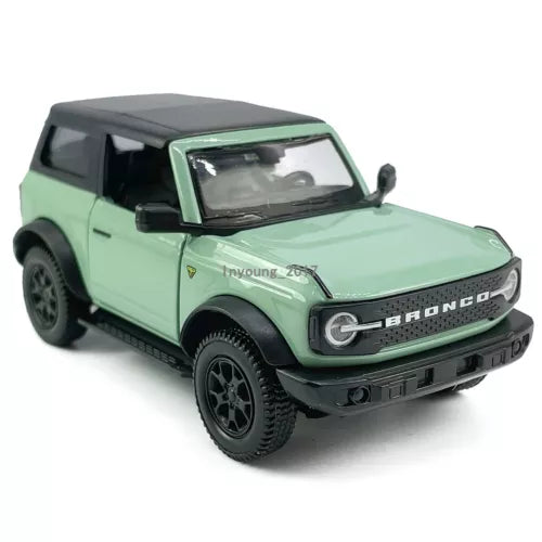 Mint green 1:36 Ford Bronco diecast SUV model car with black wheels and grille