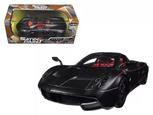 1:24 diecast model car with matte black body and red interior