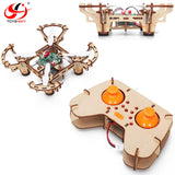 Wooden DIY quadcopter drone kit with remote control, plastic electronics and wiring