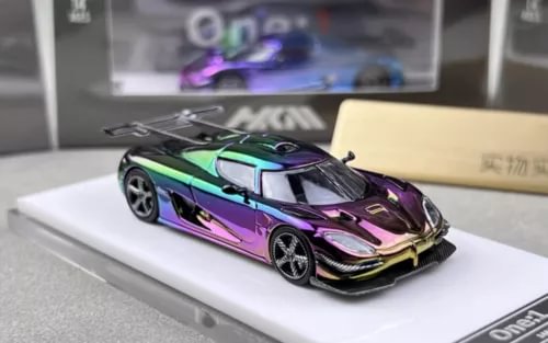 Electroplated diecast racing sports car model, black with green and purple graphics