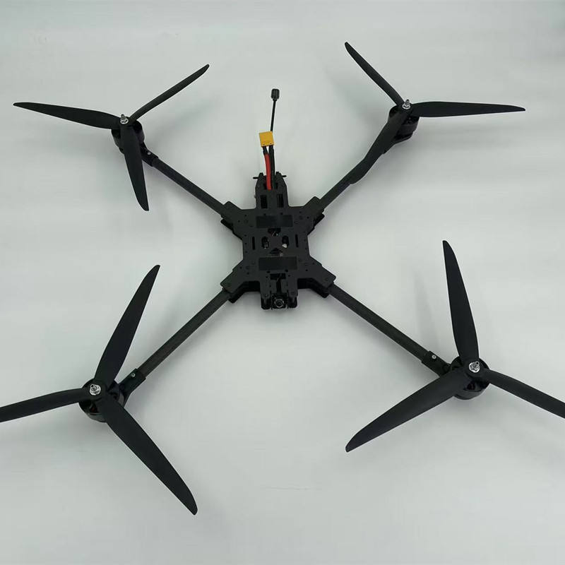 Foldable quadcopter drone with four propellers and black carbon fiber frame