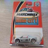 Diecast hero city model car in blister card, gray coupe with black stripe