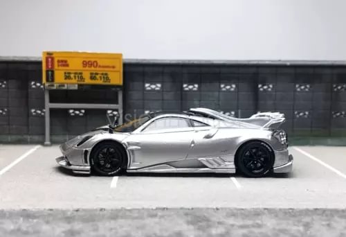 1:64 scale silver racing sports diecast model car with black wheels