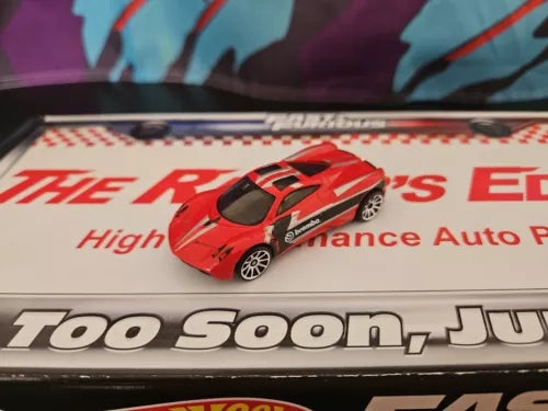 Hot Wheels Pagani Huayra 1:64 diecast model car, red with black wheels