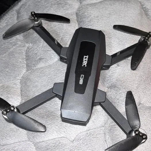 Tsrc drone quadcopter with four propellers and foldable arms
