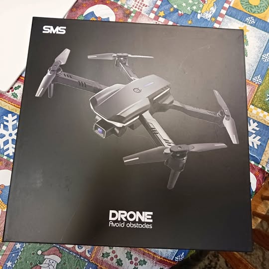 Drone box with illustrated silver quadcopter and 'DRONE' branding