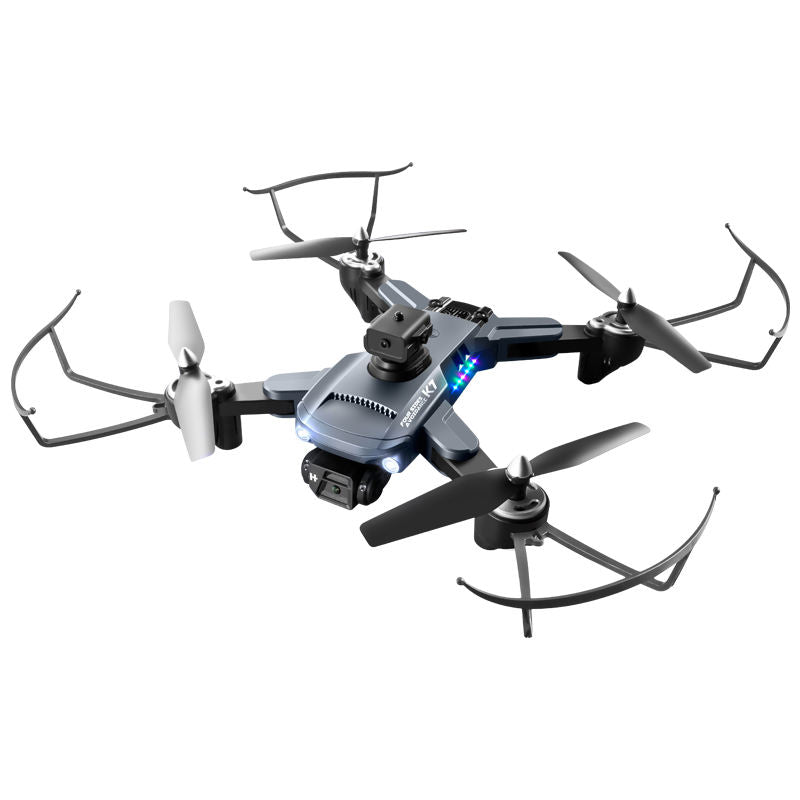 Foldable mini quadcopter drone with 4 propellers and forward camera module