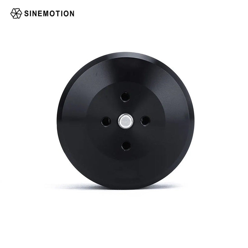 Black round drone motor with central silver hub and four mounting holes