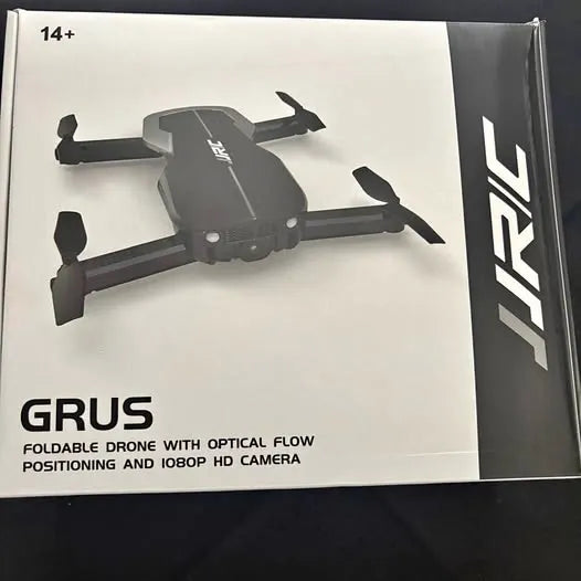 JJRC GURUS foldable drone box with 1080P HD camera text