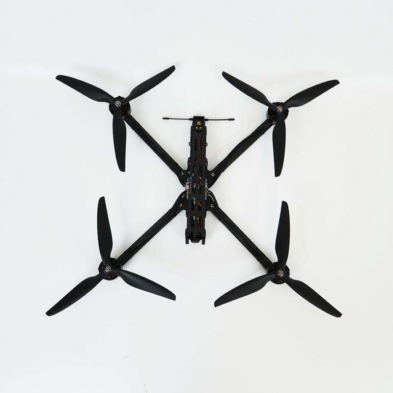 Black quadcopter FPV drone with four propellers and central frame