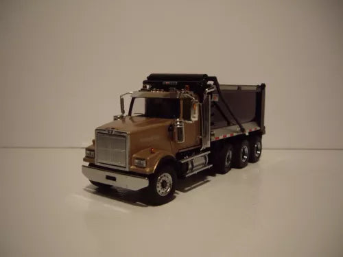 Diecast model dump truck with raised bed and tri-axle trailer, dark brown cab