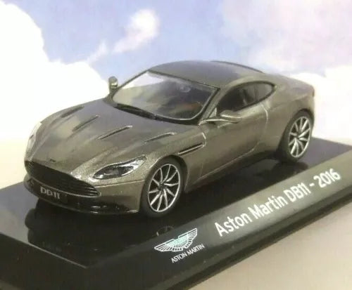 Metallic grey 2016 Aston Martin DB11 diecast model car on display base