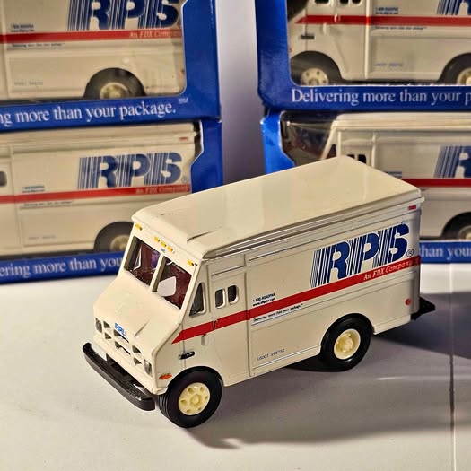 Diecast delivery truck, white with RPS logo and red stripe, 1:64 scale