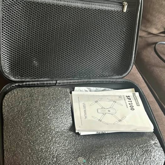 Snaptain Leander TX drone hard case with foam insert and user manual