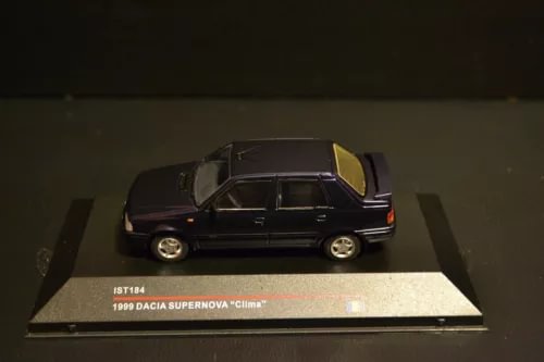 1999 Dacia Supernova Clima diecast car, dark body with yellow-tinted details, 1/43