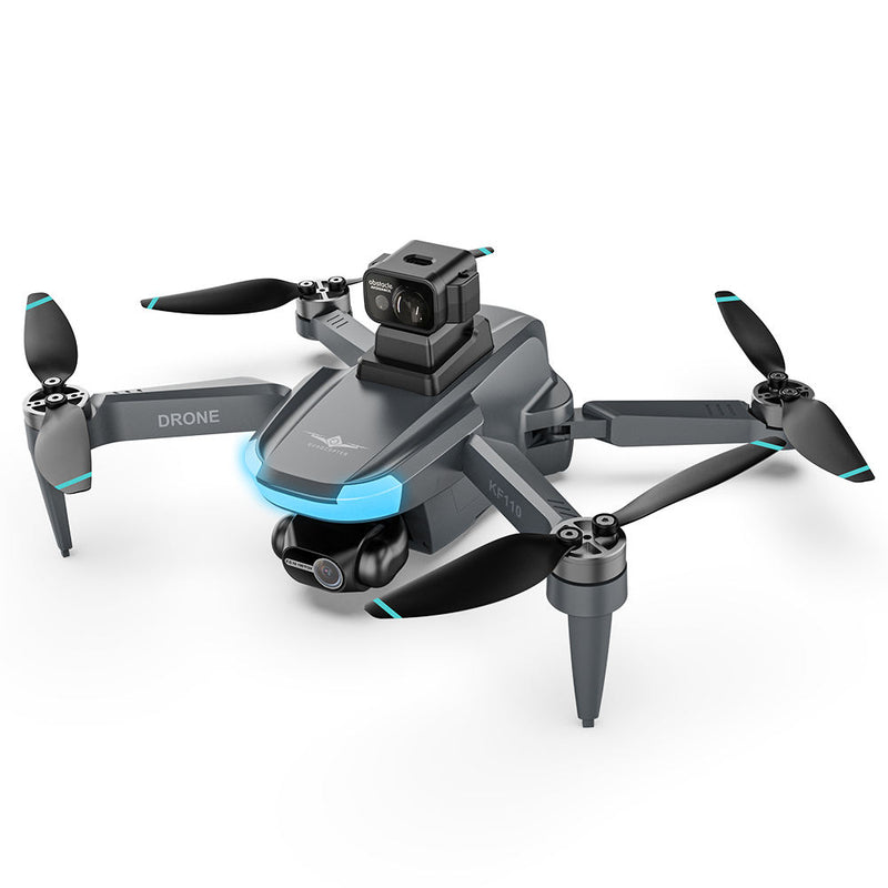 Gray mini quadcopter drone with front camera gimbal and four foldable propellers