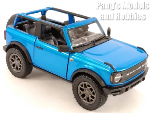 Blue open-top Ford Bronco 1/36 scale diecast SUV model with doors and roll bar