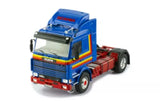 Blue diecast Scania 142M tractor unit with red stripe detailing and chrome front grille