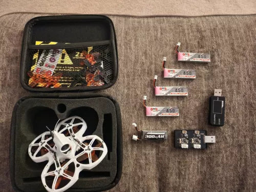 Indoor FPV racing drone bundle with carrying case, drone frame, and batteries