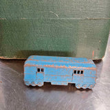 Vintage blue diecast toy bus with molded windows and wheels