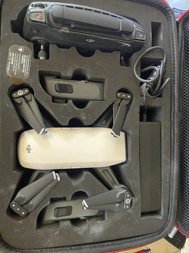 DJI Spark Mini2 drone and remote, folded inside protective hard case