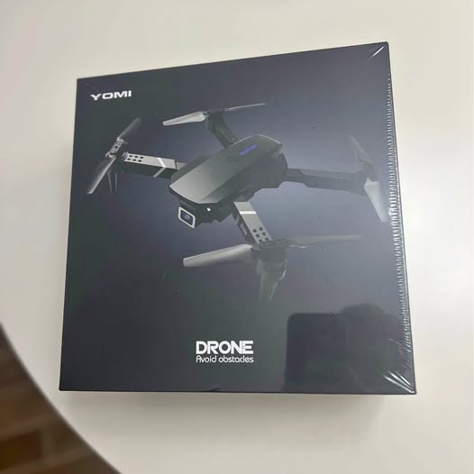 Drone box with 4K drone illustration and brand YOMI