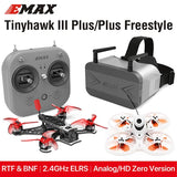 FPV RC drone kit with grey controller, quadcopter and white FPV headset
