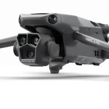 Small gray drone with front dual camera module and stabilized gimbal arm