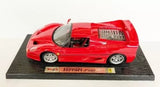 Red Maisto diecast Ferrari F60 model car with moving parts