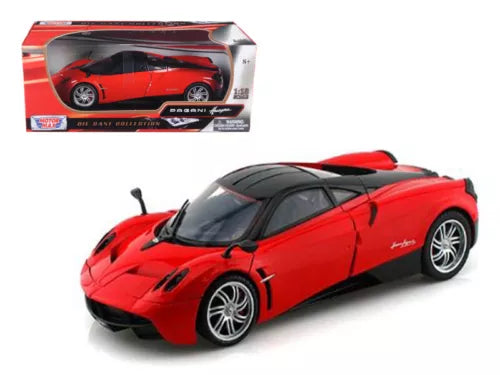 Red diecast sports car model with front three-quarter view, black hood and wheels.