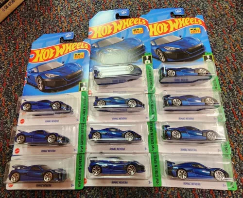 Hot Wheels diecast car set, multiple blue car models in blister packs