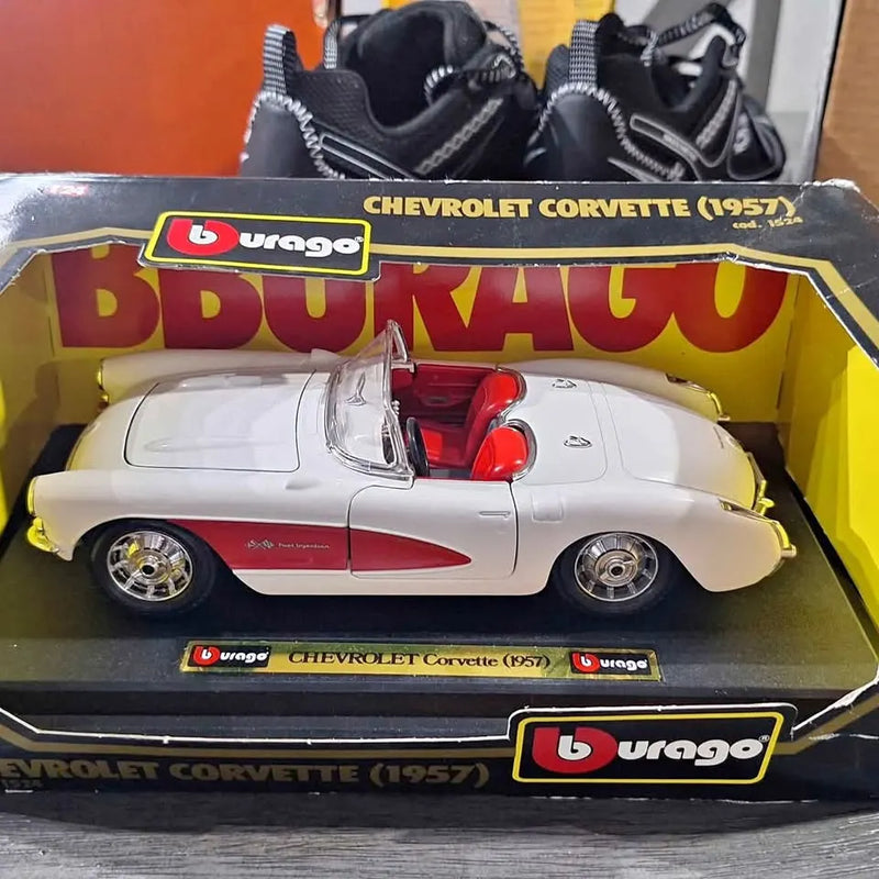 White Chevrolet Corvette diecast model (1957) in retail box with Bburago logo