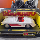 White Chevrolet Corvette diecast model (1957) in retail box with Bburago logo