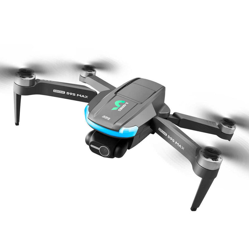 Foldable GPS drone, gray quadcopter with 4 propellers and gimbal camera