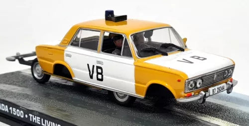Diecast model sedan with yellow and white paint, front grille and V8 side decal