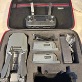 Mavic Pro drone kit in open hard case with controller and battery slots