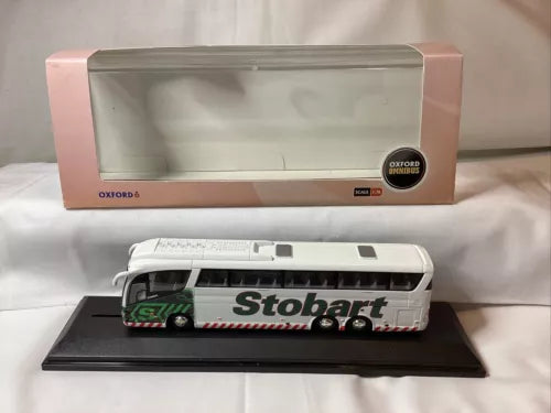 Diecast coach model in Stobart livery, white body with green and red detailing on base