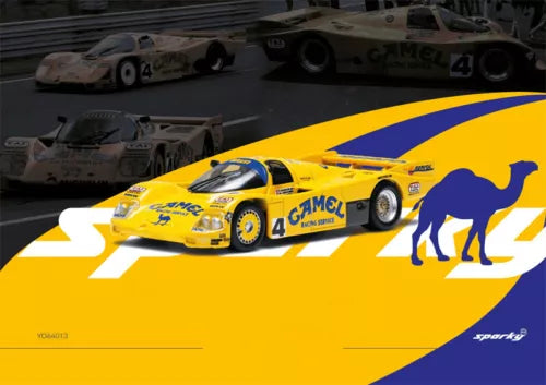 Yellow race car diecast model with number 4 and camel graphic on side