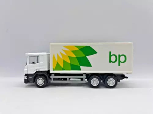 Diecast delivery truck model with white cab and bp logo on box trailer