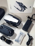 DJI Mavic Air drone in arctic white, with black controller and cables (no battery)