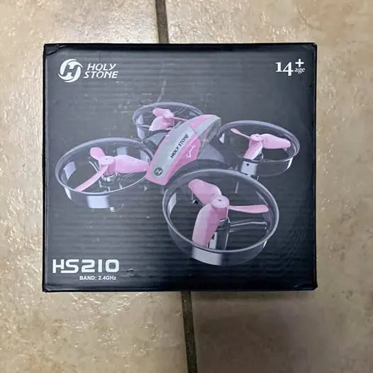 Mini HS210 drone box with pink quadcopter and propellers, Holy Stone 14+ years