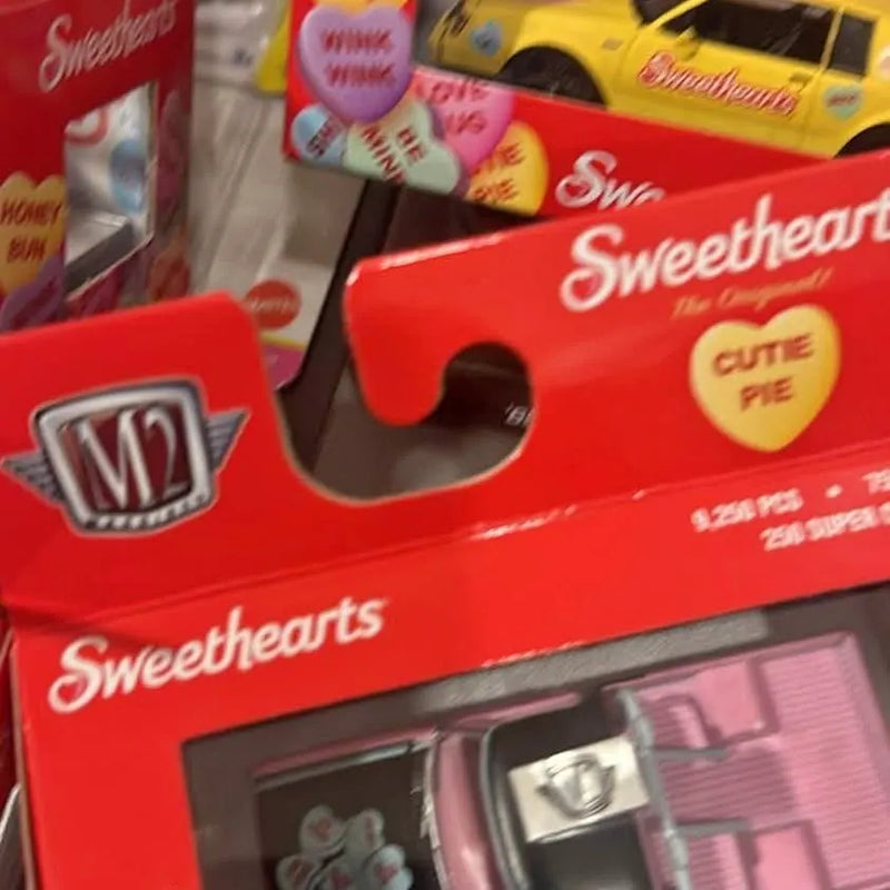 Red M2 diecast car with Sweethearts logo and chrome LM hood emblem