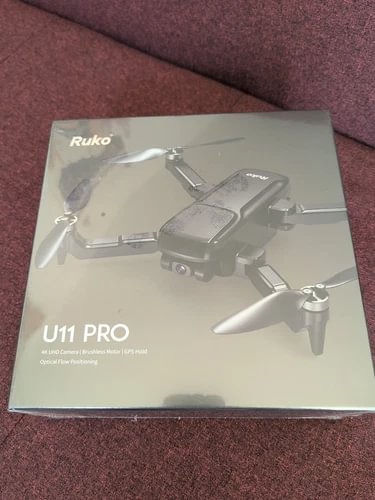 Ruko U11 Pro foldable remote control camera drone box with drone illustration