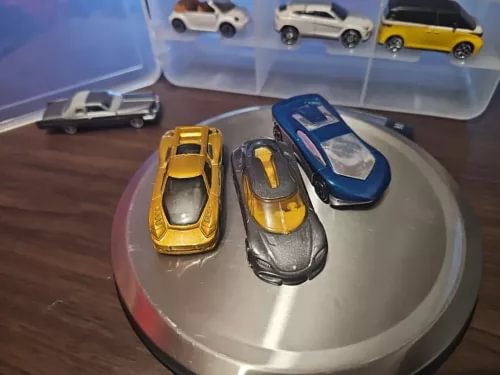 1/64 diecast car set, three cars in gold, black and blue