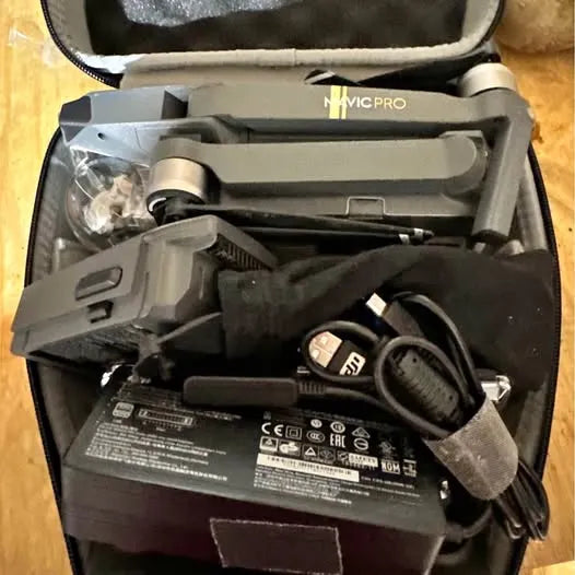 Drone in hard carrying case with cables and accessories