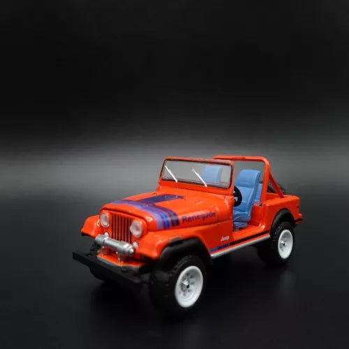 Orange Jeep CJ7 Renegade 1:64 diecast model car, front 3/4 view with open top