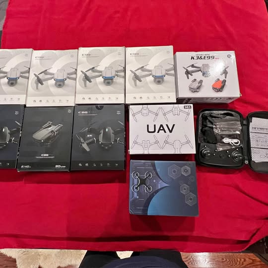 Drone kit with boxed drones, controller, and accessories