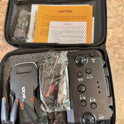 Drone remote controller with buttons in open hard case