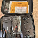 Drone remote controller with buttons in open hard case