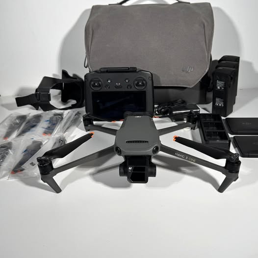 DJI Mavic 3 drone with controller and protective carry case, quadcopter body visible